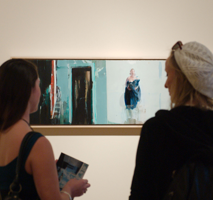 people looking at art 