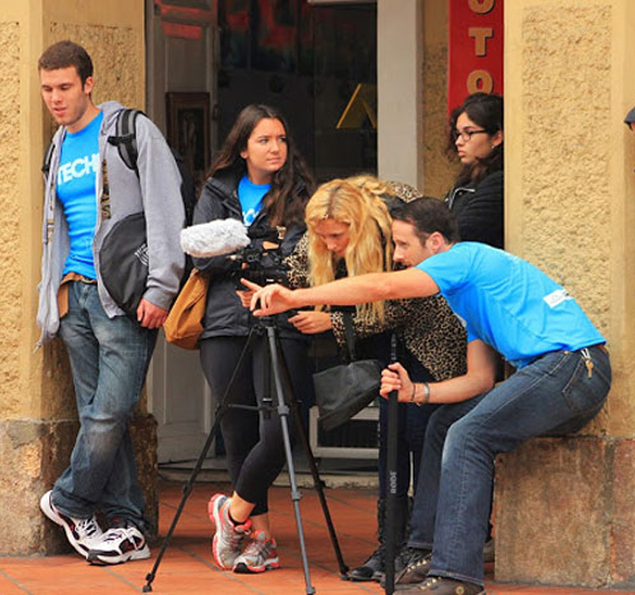 students filming 