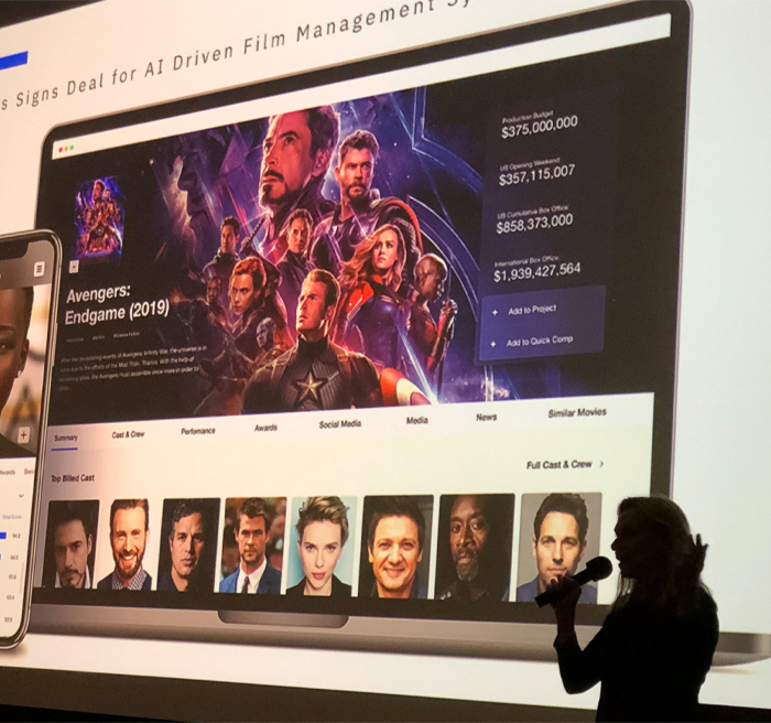 A person presenting at a conference.