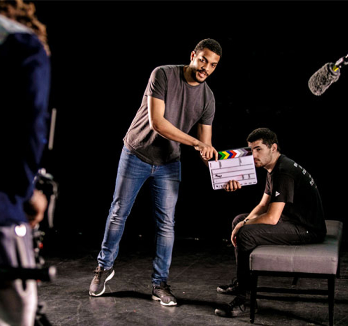 Student using clapper board