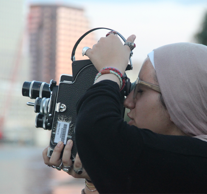 student working with video camera 