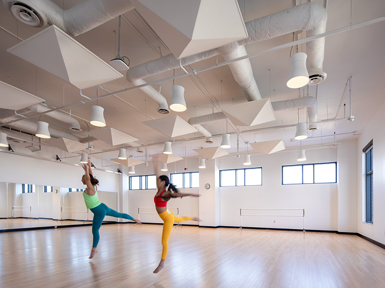 Two students practicing in a dance studio in Ferman Center for the Arts.