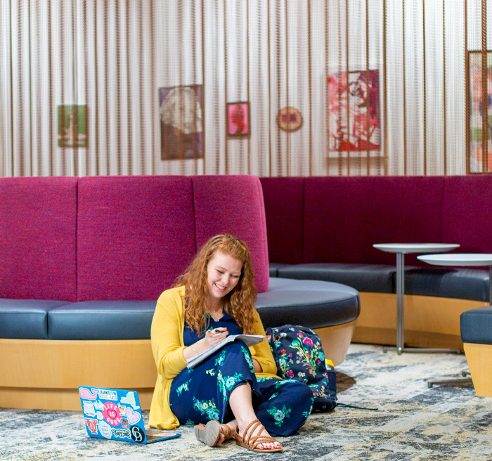Student sitting in lobby 