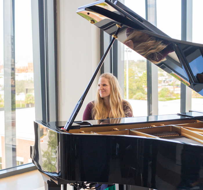student playing piano
