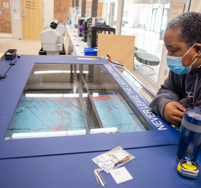 Individual using art laser