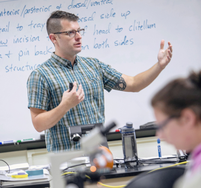 Professor Dan Huber giving a biology lecture.