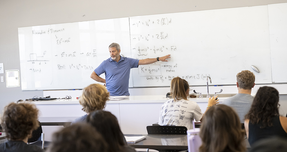 Professor teaching in a physics course