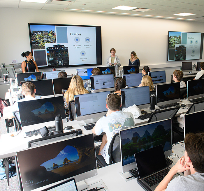 Students in class setting up