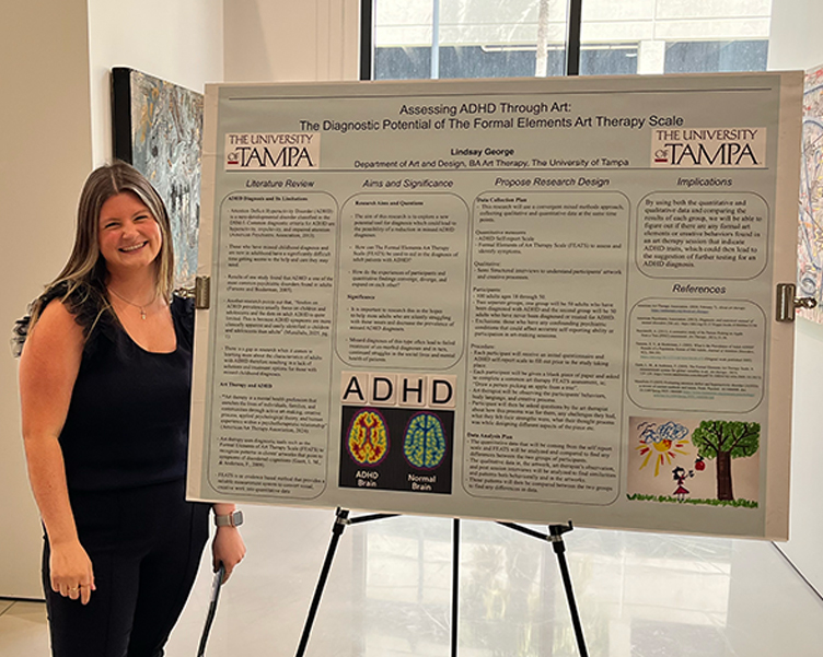 A student next to her research poster at CAL Student Research Day