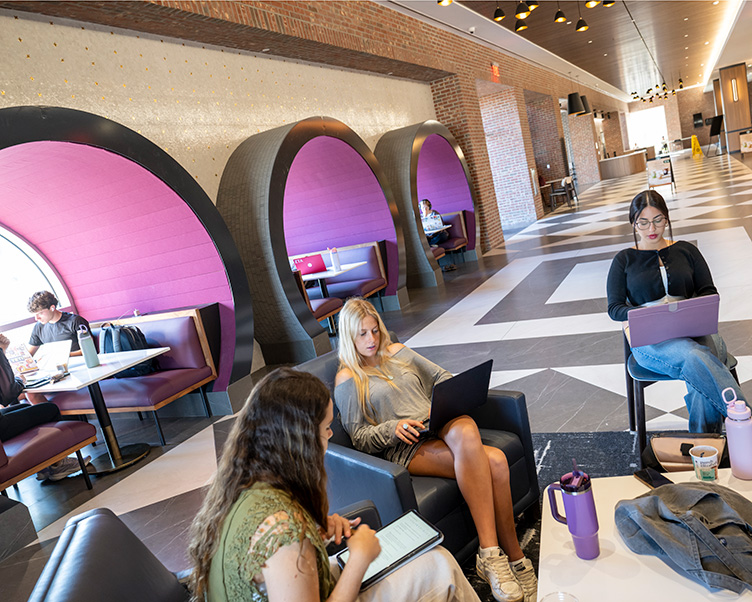 Students studying in a group in the Grand Center.