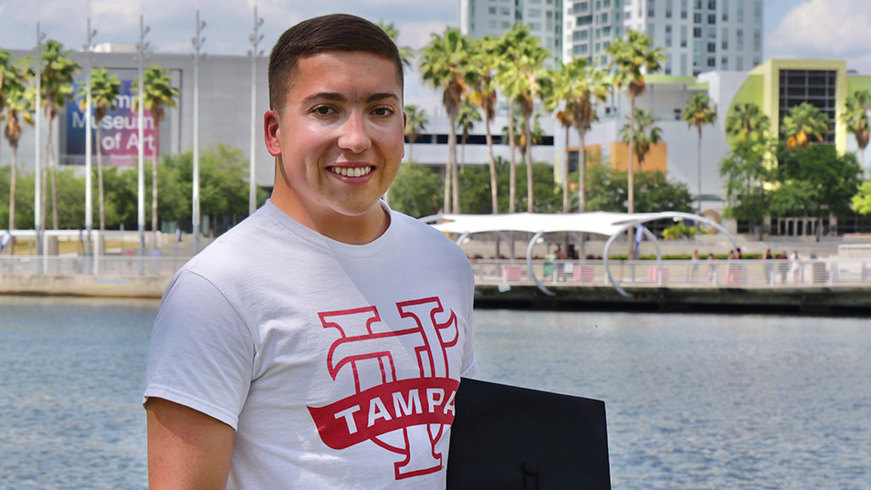 A student in front of the river